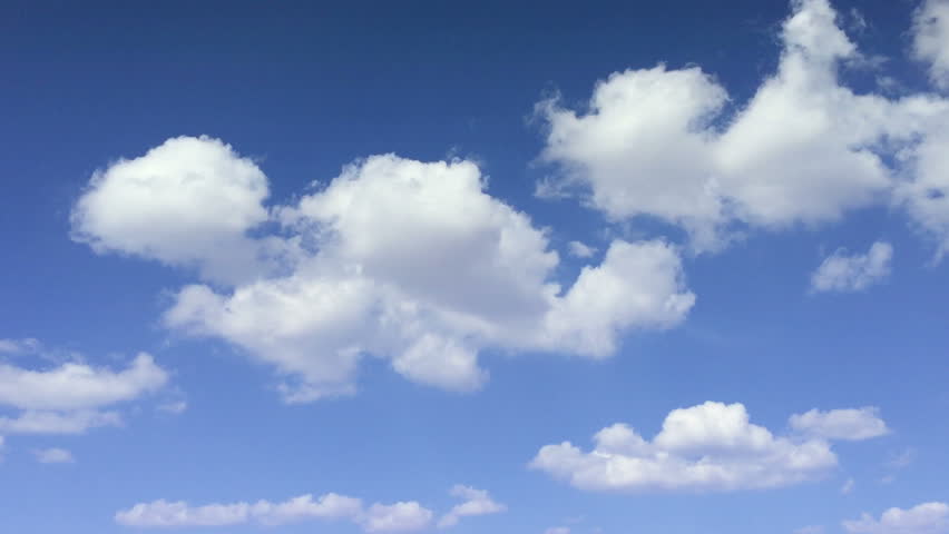 Summer Clouds Fly Across A Royal Blue Sky. Hd 1080p Timelapse. Stock 