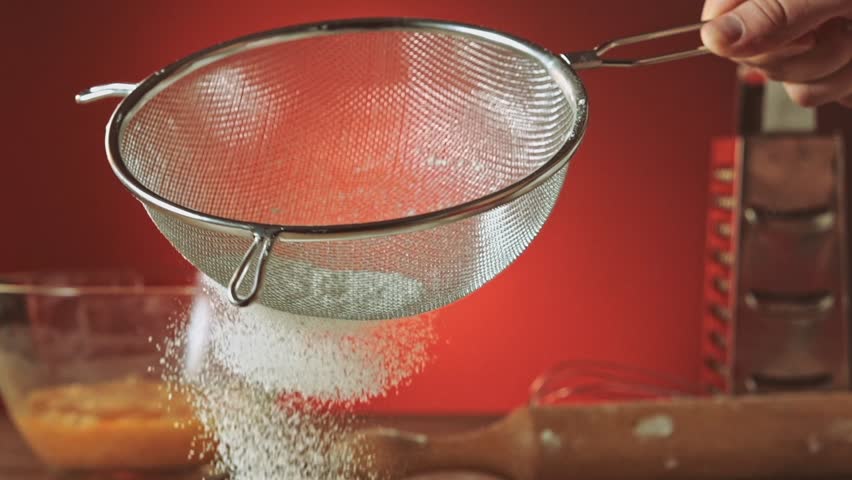 sifting-flour-through-sieve-slow-motion-240fps-baker-sifting-measured