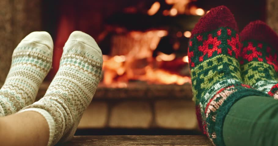 sock fireplace relaxes by warm in woollen socks and a sock fireplace relaxes by warm in woollen socks and a