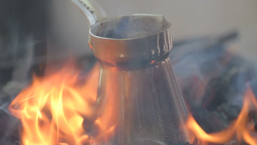 Close-up Of Bronze Coffee Maker Standing On Fire Stock Footage Video 1278778 - Shutterstock