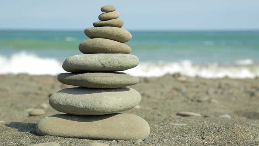 zen stones on a beach stock footage video 6076793 zen stones on a beach stock footage video 6076793