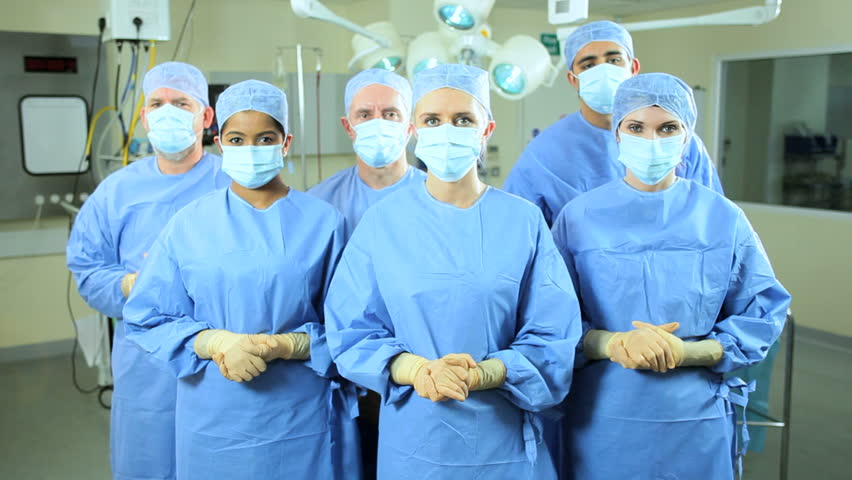 portrait-young-asian-trauma-nurse-wearing-full-surgical-scrubs-smiling