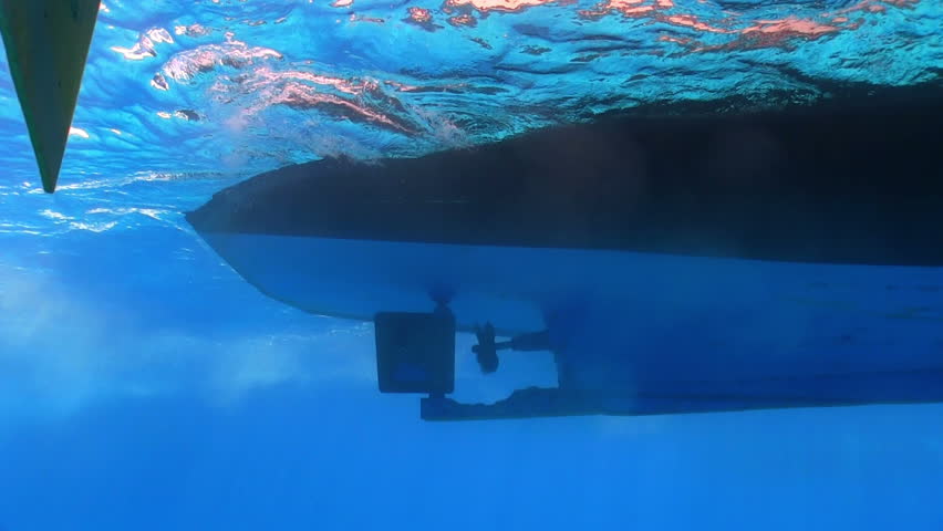 View Of The Propeller From The Bottom Of The Ship Under Water Stock