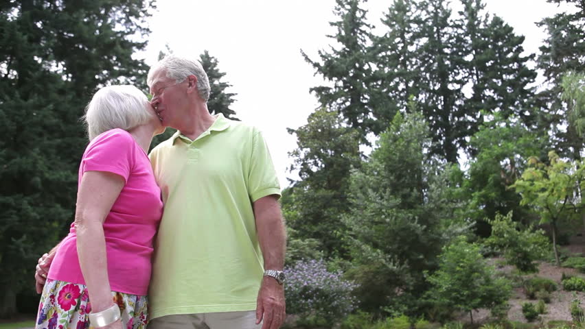 Retired Husband And Wife Walking And Talking In The Open Air Stock Footage Video 4961522