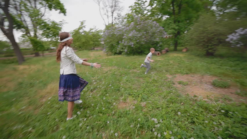 Mother Pushing Daughter On Swing Stock Footage Video 4724