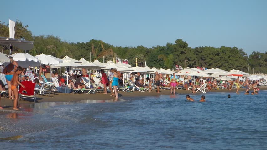 ALEXANDROUPOLIS, GREECE - SEP 1, 2014: Crowded Summer Beach At A ...