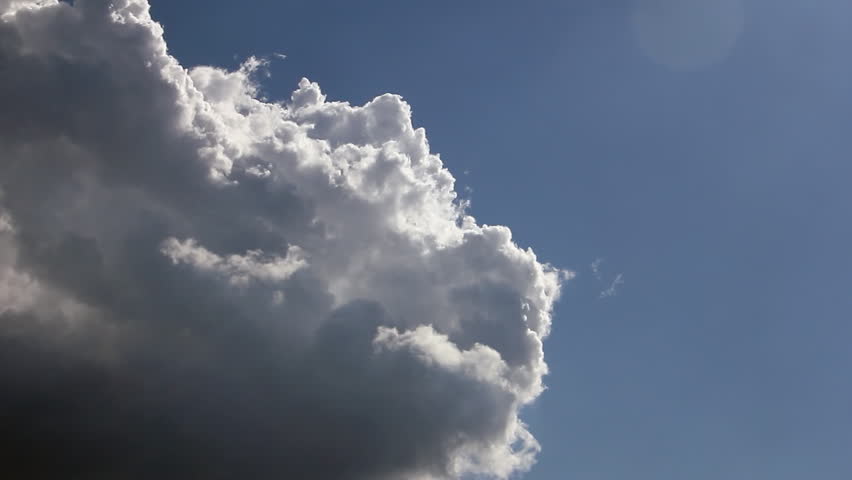Big Rain Cloud Transforming On The Blue Sky Stock Footage ...