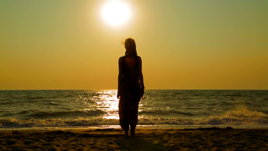Woman On The Beach In Sunset - Nude Silhouette Stock 