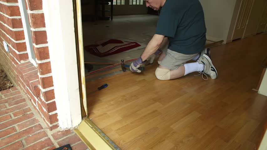 Removing Laminate Flooring how to remove carpeting and install laminate flooring A Workman Or Homeowner Handyman Type Engaged In A Diy Project Of Removing Old Laminate Flooring Removing Laminate Flooring best way to remove linoleum flooring concrete youtube A Workman Or Homeowner Handyman Type Engaged In A Diy Project Of Removing Old Laminate Flooring