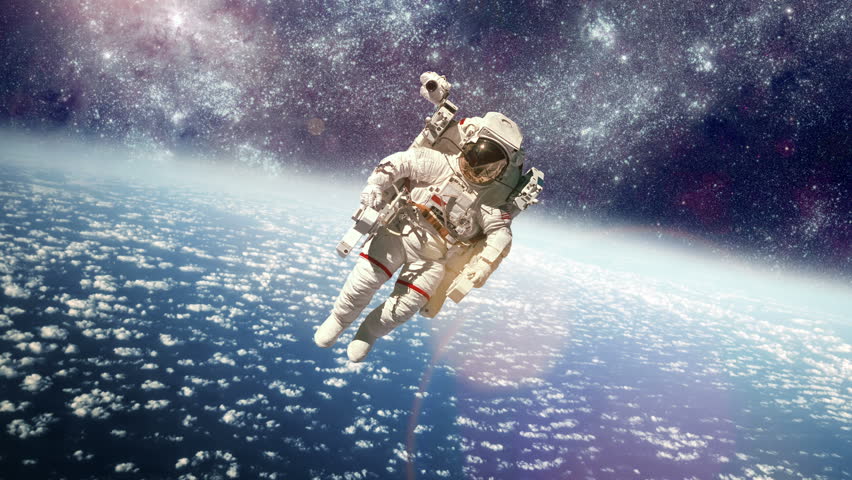 Astronaut In Outer Space Against The Backdrop Of The Planet Earth