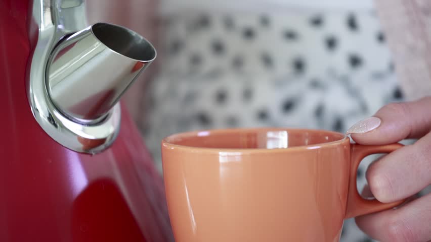 Young Woman Pouring Hot Water From Teapot Into Cup Stock Footage Video ...