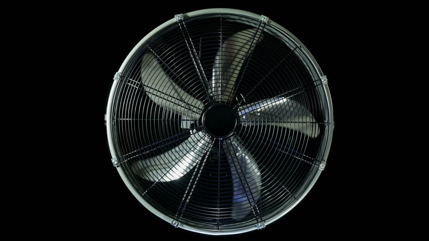 Fan With Grid, Swiveling Movement, On Black Background, Yellow Light ...