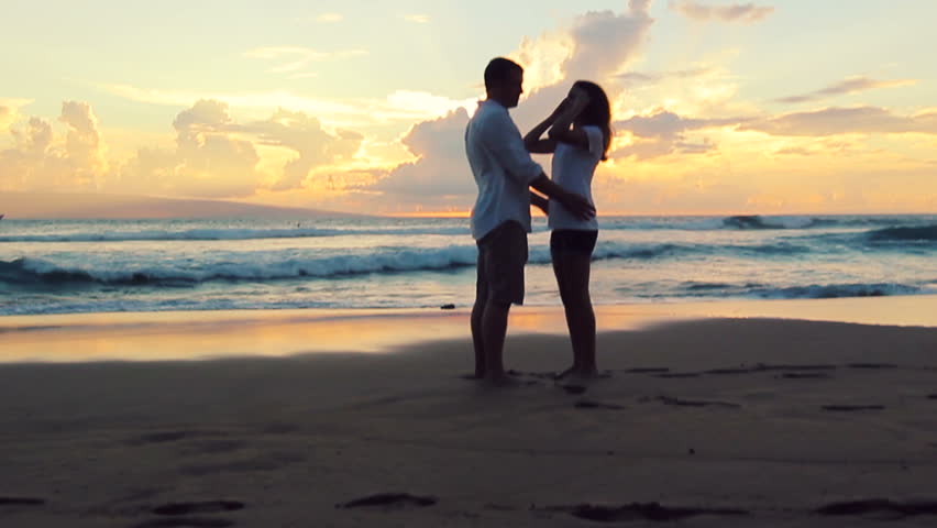 Honeymoon Passionate Couple Holding Hands Walking Into Sunset. Romantic ...