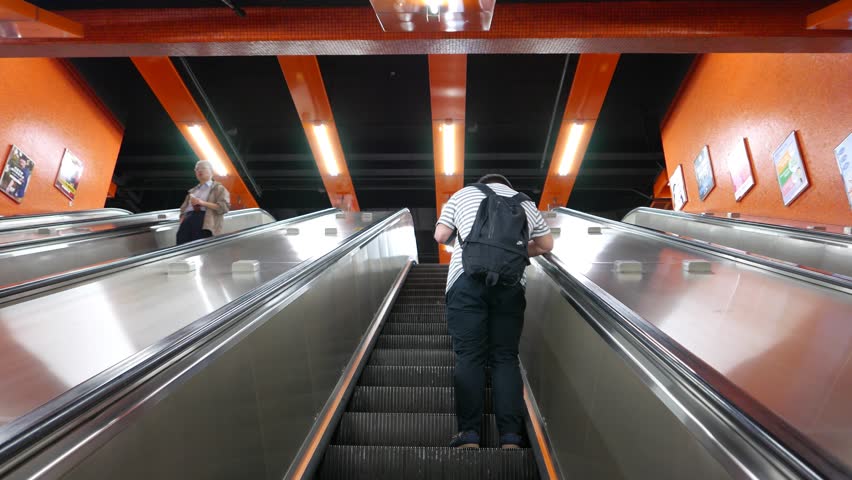 TAIPEI, TAIWAN - FEBRUARY 15, 2015: POV Walk Up Escalator At Metro ...