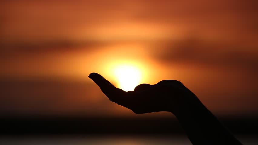 Sun On Female Hand. Silhouette Of Hand Holding Sun. Focus Moving From ...