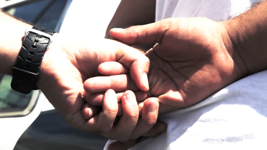 Close Up Of Person Being Handcuffed Stock Footage Video 2268785 ...