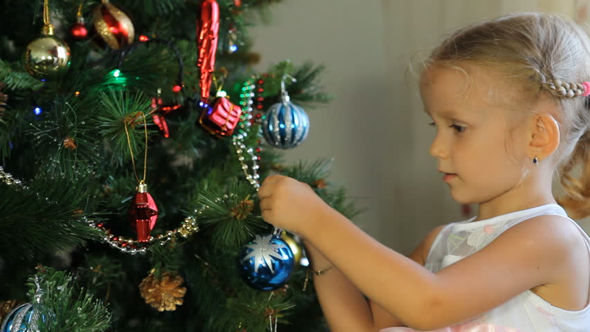 Child Decorating Christmas Tree, Little Girl With Xmas Ball, Winter ...