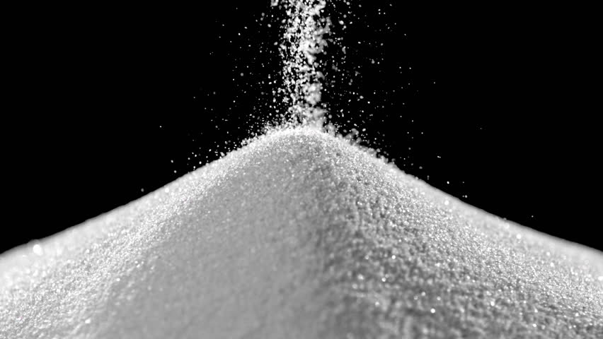 Pile Of Sugar On Black Background Shooting With High Speed Camera ...