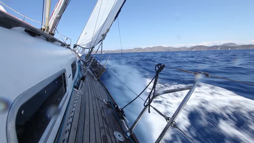 Sailing In The Wind Through The Waves. Sailing Boat Shot In Full HD At ...