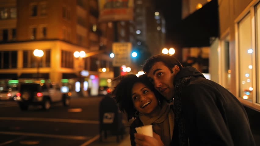 A Romantic Couple In An Embrace Stand Beside A Busy London Road At ...