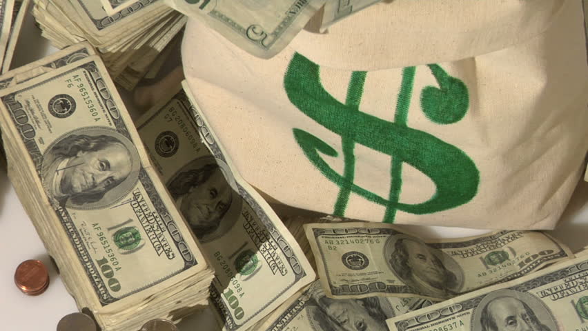 Money Bag On Pile Of Cash Stock Footage Video 4542044 - Shutterstock