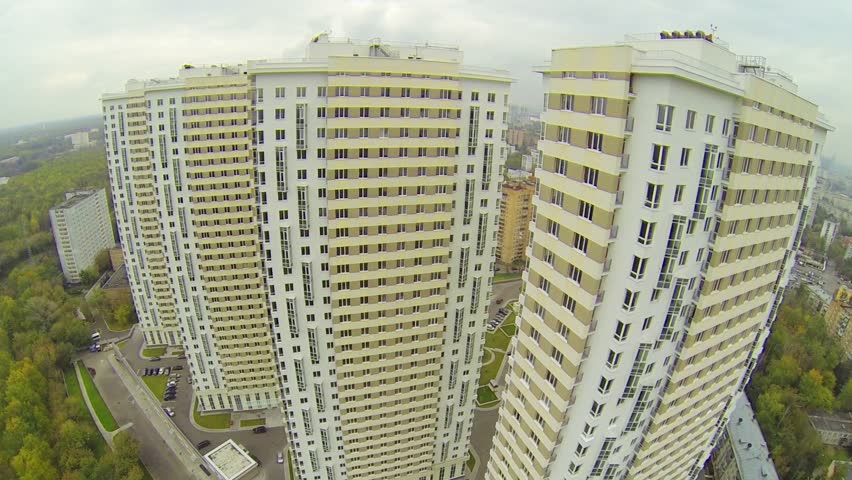 Residential Compound With Parking Lot And Playground During The Day ...