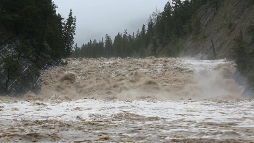 Flood Water Cascading Down Swollen Mountain River Nr Banff, Alberta ...