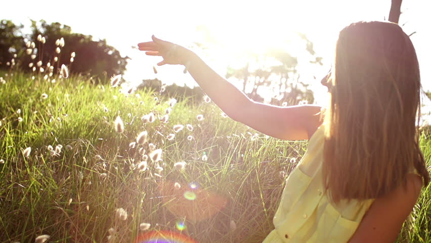 Girl Is Touching Grass With Hand In Slow Motion Stock Footage Video ...