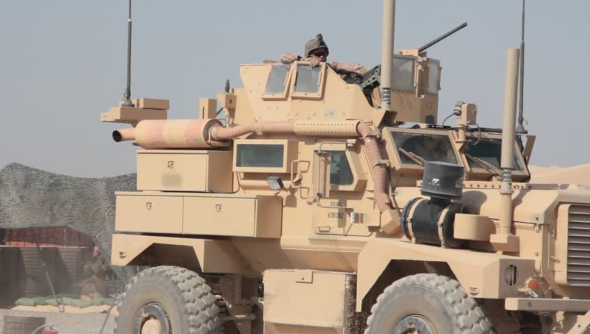 Afghanistan, Circa 2011: US Marine Gunner Rides On Top Of MRAP With ...