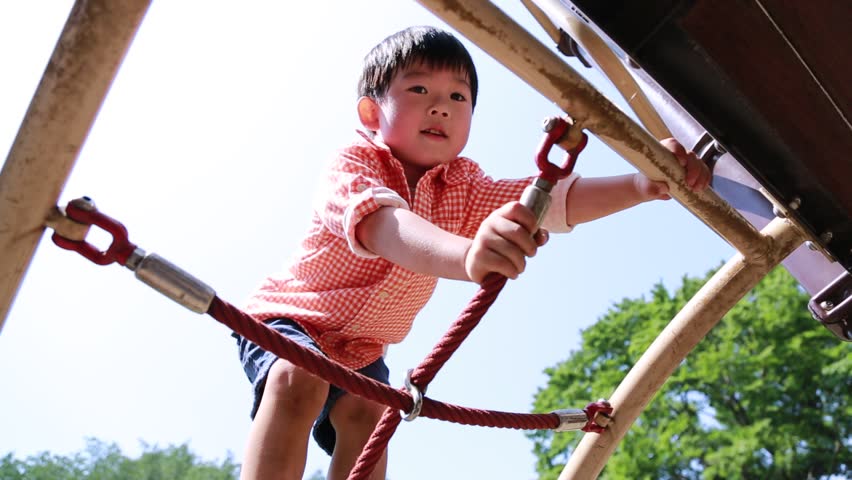 Japanese Young Boy Playing At Playground In A Park, Tokyo, Japan Stock ...