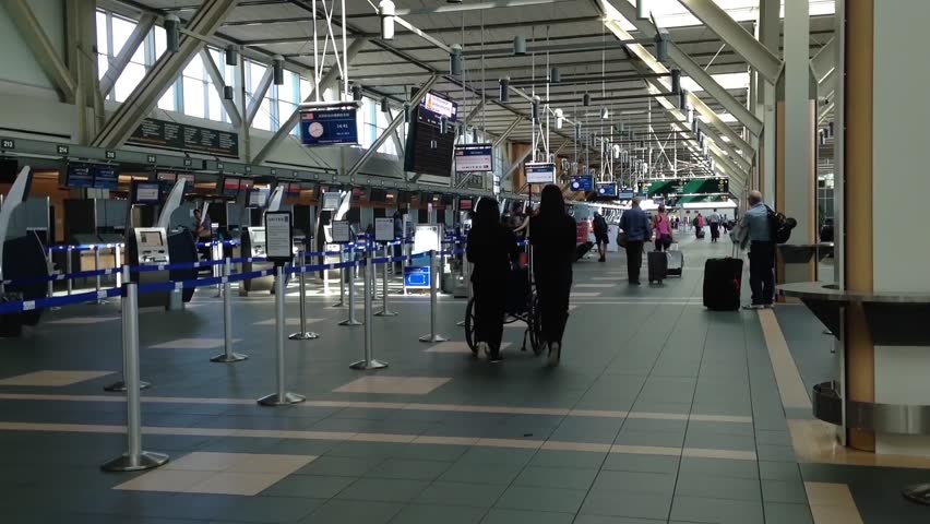 Vancouver, BC Canada - September 13, 2014 : Passengers With Luggage ...