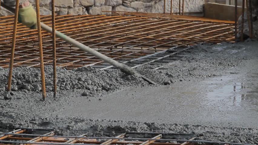 Spreading Concrete, Concrete Pouring Works, Laborer Compacting Liquid ...