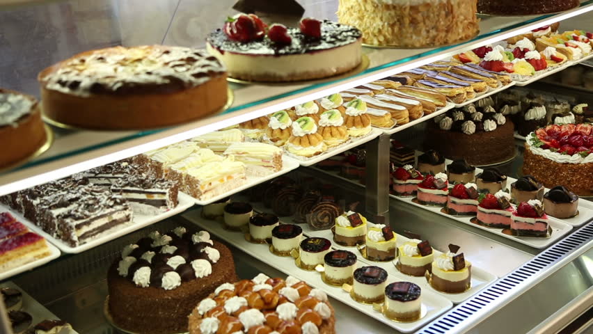 Cakes And French Pastry, Inside A Confectionery Shop, Dolly Shot Stock ...