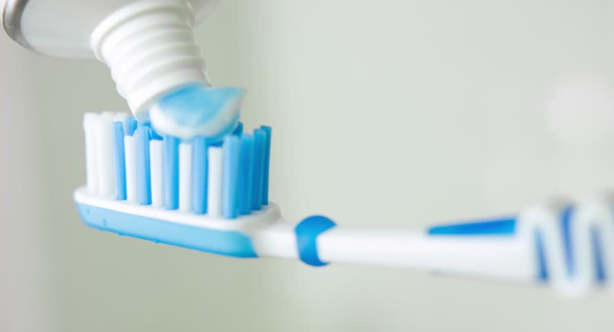 Toothpaste Smear On A Blue Toothbrush. HD H.264 Stock Footage Video ...